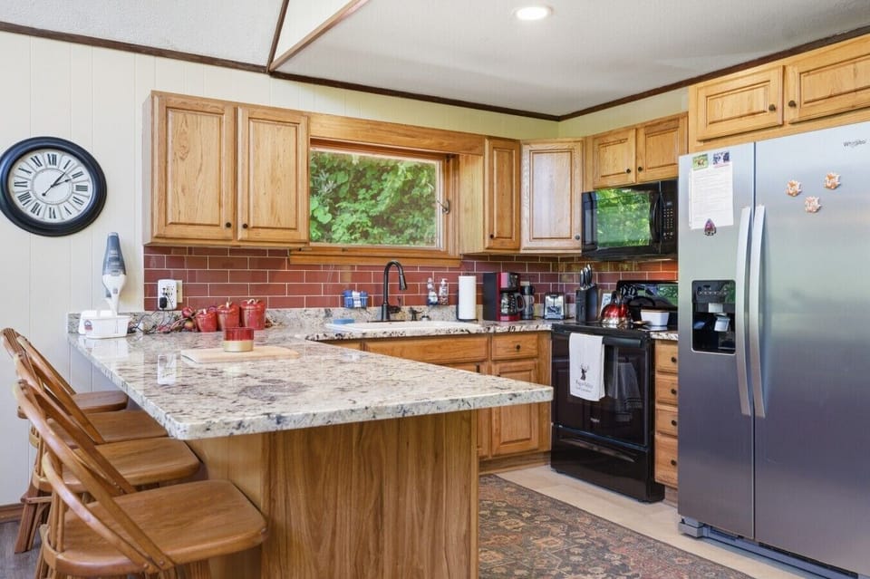 Kitchen Hub | Breakfast Bar Seating & Stainless Appliances