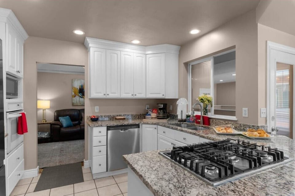 Kitchen 1 | Built-In Oven | White Cabinetry & Dishwasher