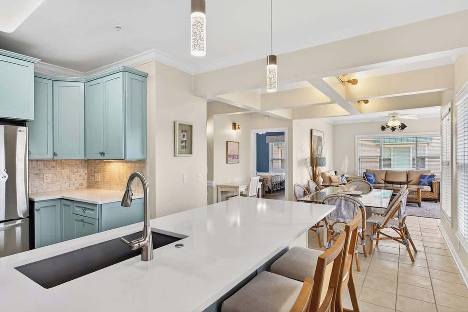 Open layout keeps everyone connected from living room to kitchen.