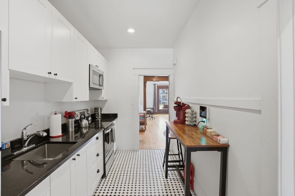 Kitchen with plates, utensils, cups, and all you need to dine.