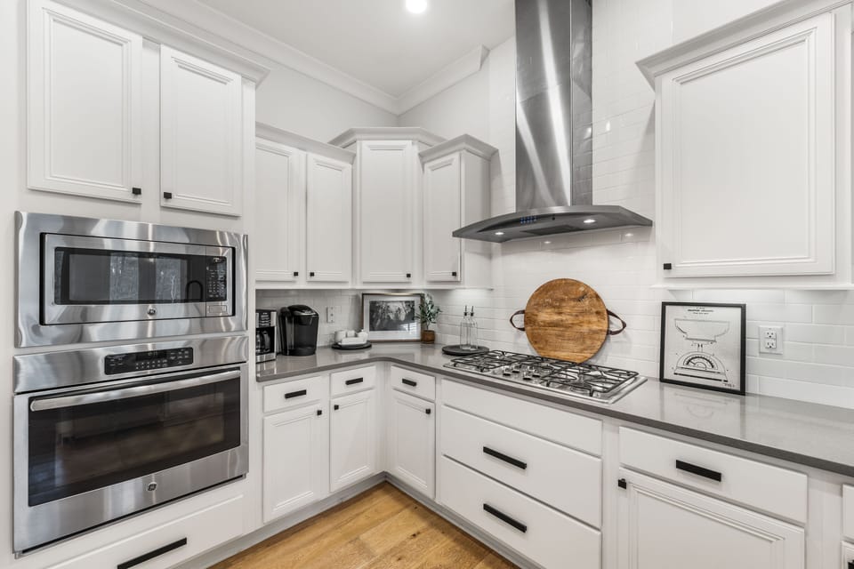 Fully Equipped Gourmet  Kitchen with White Cabinetry
