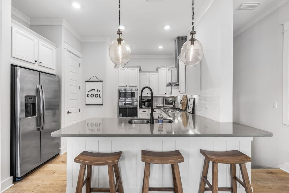 Breakfast bar with three comfortable bar  stools - perfect for casual dining.