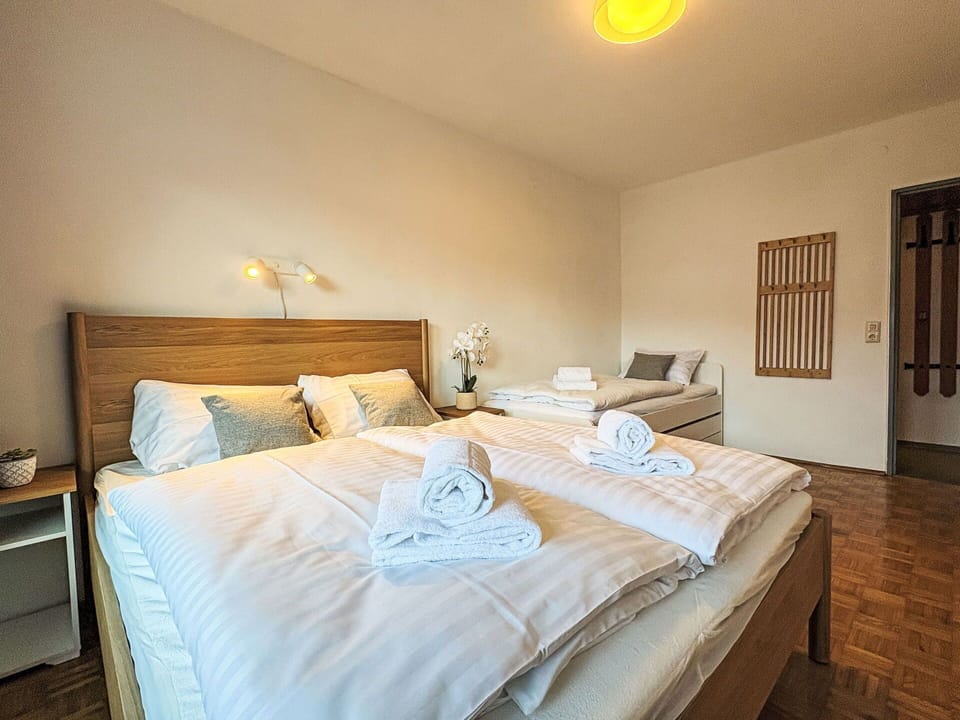 Bed, Bedroom, Wall, Bed Sheet, Interior Design, Bedding, Wood, Floor, Flooring, Room