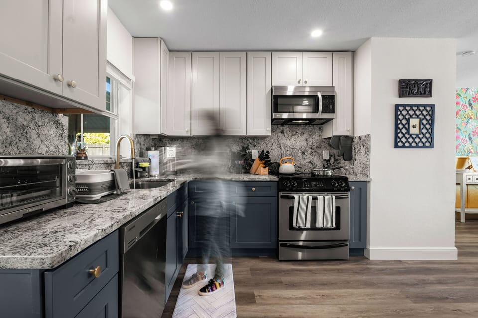The fully equipped kitchen makes "nights in" a breeze after a long beach day.