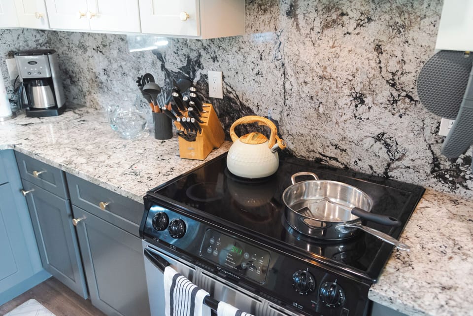 The fully equipped kitchen makes "nights in" a breeze after a long beach day.
