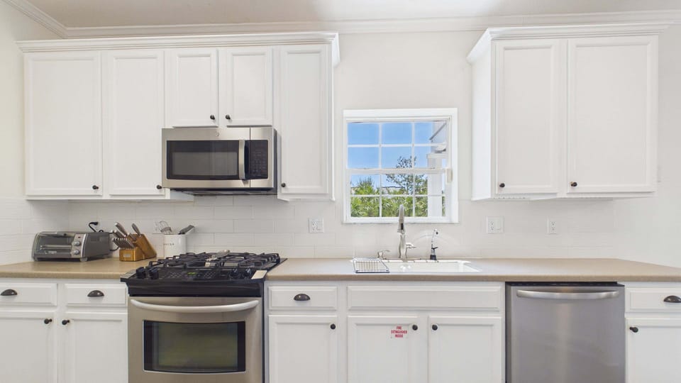 2nd Floor: Fully equipped kitchen with breakfast bar and all the cooking essentials