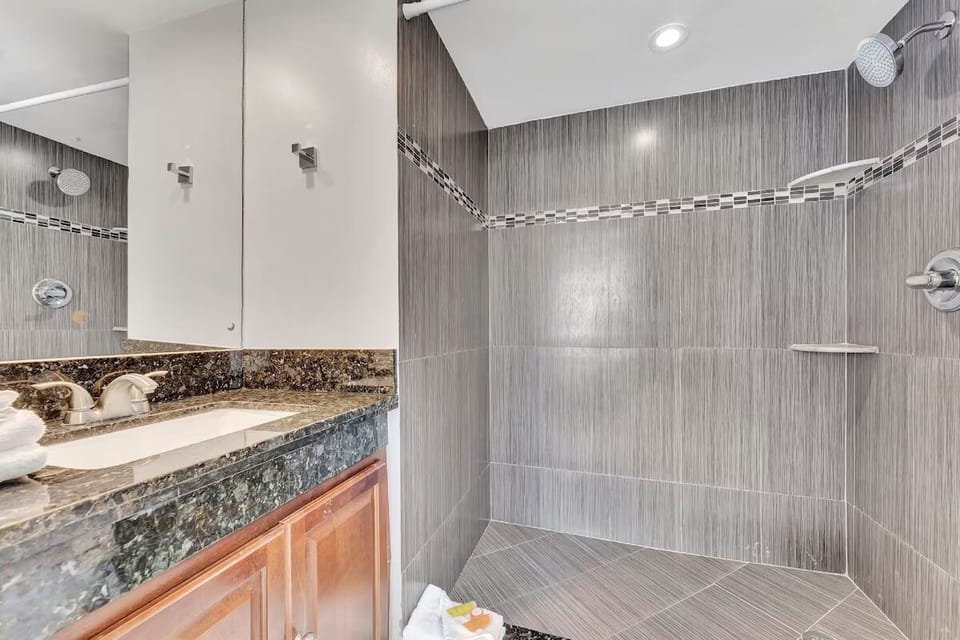 Wash away the day in a roomy walk-in shower.