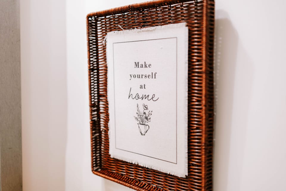 A friendly reminder to settle in, relax, and enjoy your stay.