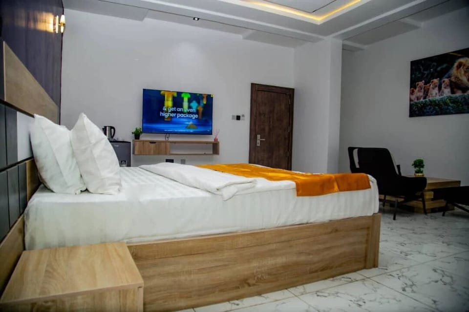Deluxe Room, Balcony, City View | In-room safe, desk, laptop workspace, blackout drapes