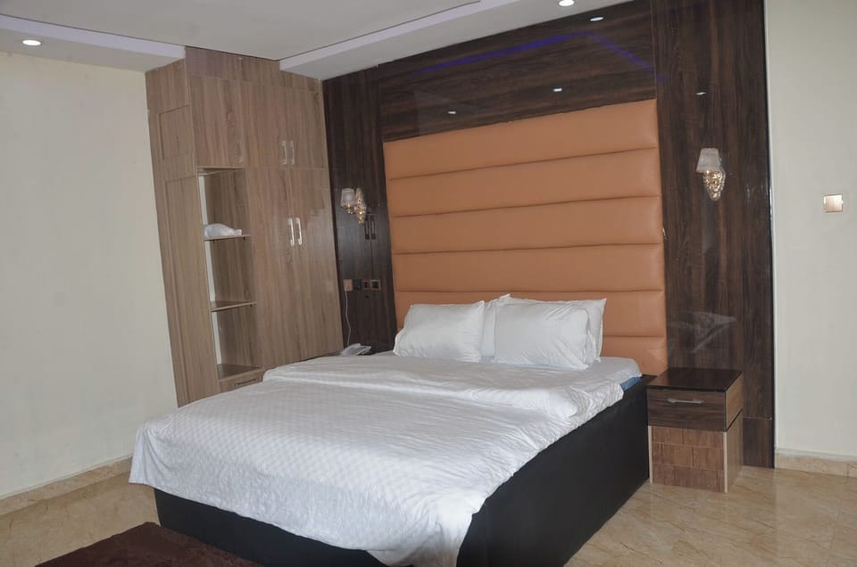 Deluxe Room, Balcony, City View | In-room safe, desk, laptop workspace, blackout drapes