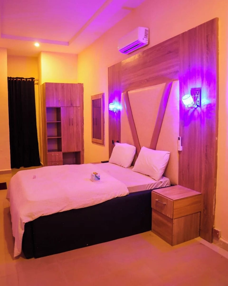 Deluxe Room, Balcony, City View | In-room safe, desk, laptop workspace, blackout drapes