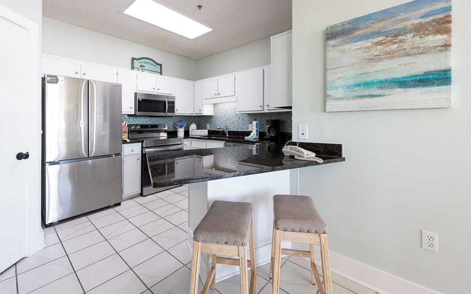 Create delicious meals in the spacious kitchen and gather at the counter stools for lively conversations