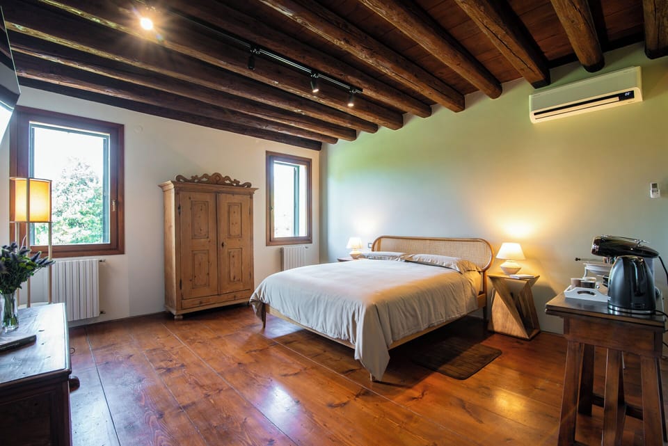 Junior Suite, Garden View | In-room safe, blackout drapes, free WiFi