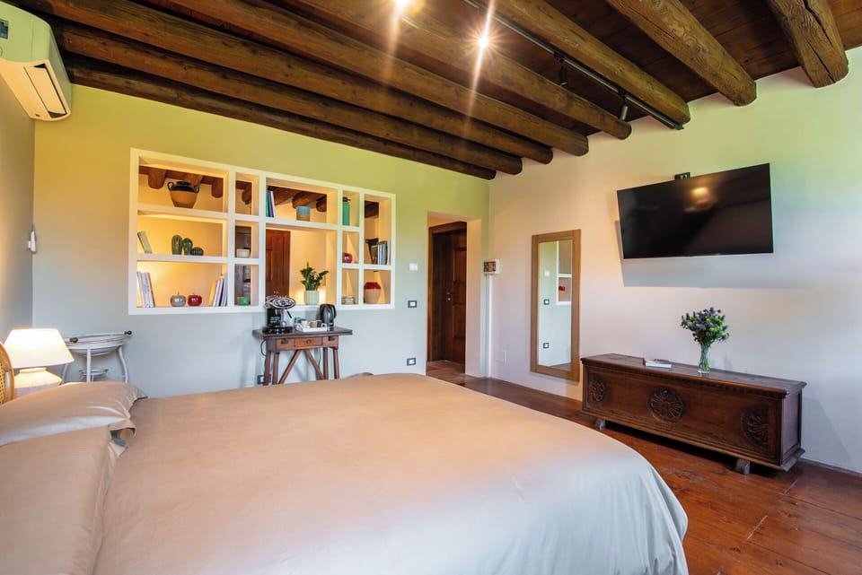 Junior Suite, Garden View | In-room safe, blackout drapes, free WiFi
