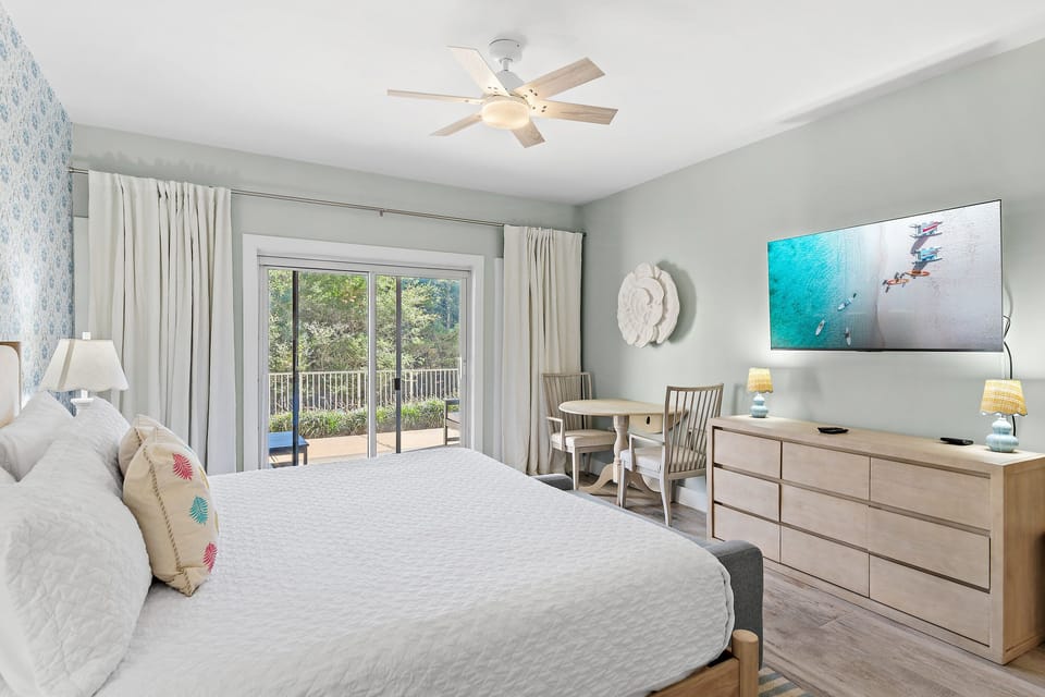 This Remodeled Studio has a King Bed, Custom FULL Bunks, Kitchenette, Patio, Smart TV, Remodeled Bathroom with Dual Vanity and Walk in Shower