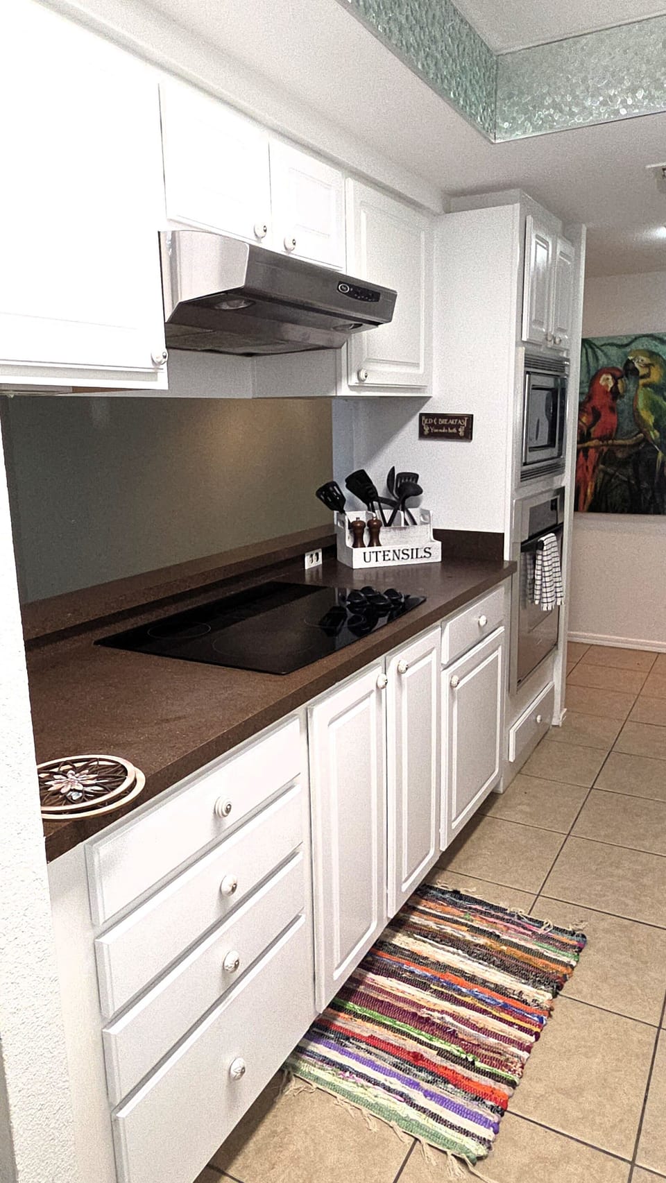 There is an electric range and plenty of storage