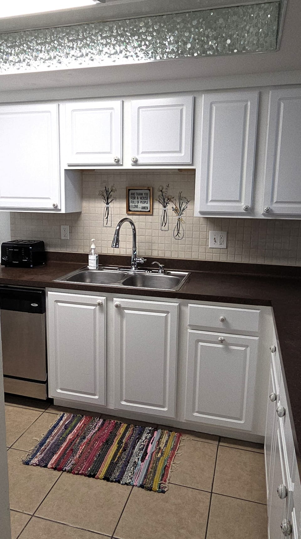 The kitchen comes stocked with basic cookware and appliances