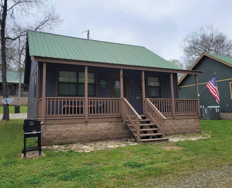 Cabin #7 with grill ~ front door view