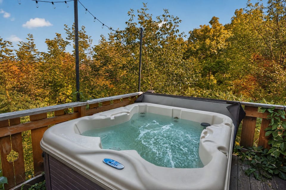 Outdoor hot tub overlooking the trees