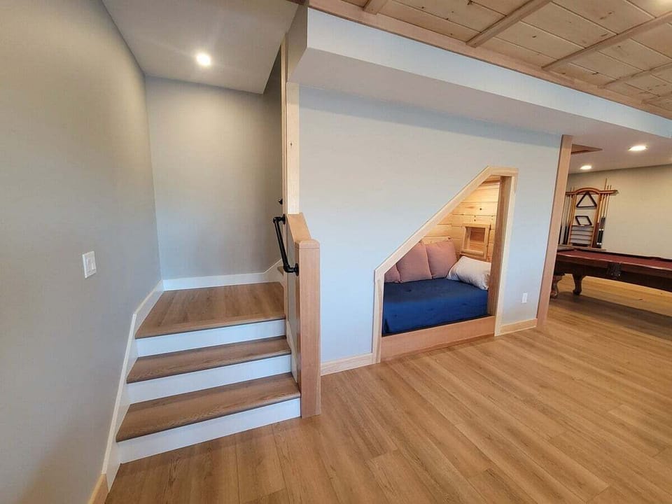 Hideaway twin bed under stairs!