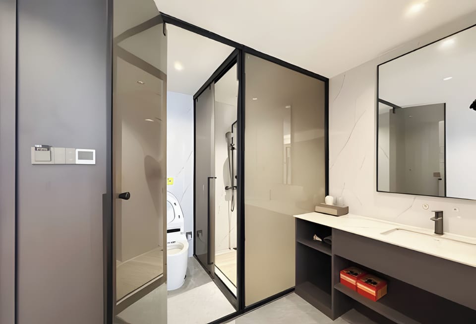 Shower, rainfall showerhead, designer toiletries, hair dryer