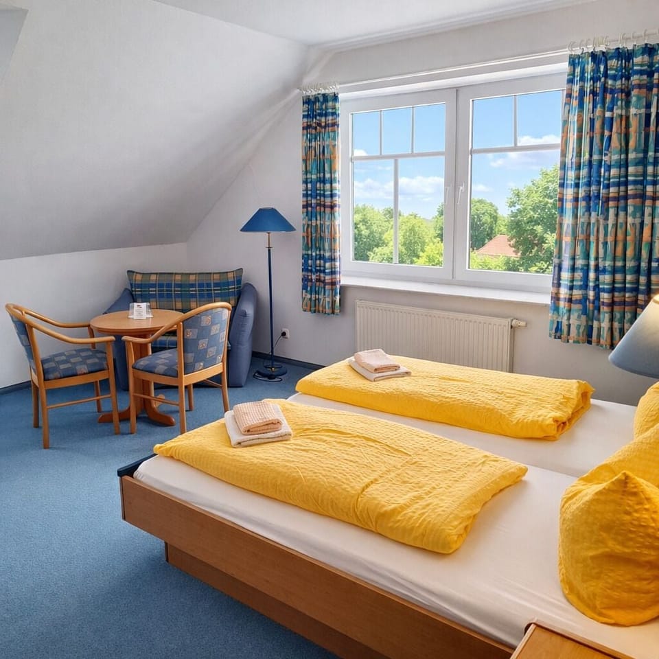 Triple Room | Hypo-allergenic bedding, minibar, in-room safe, blackout drapes
