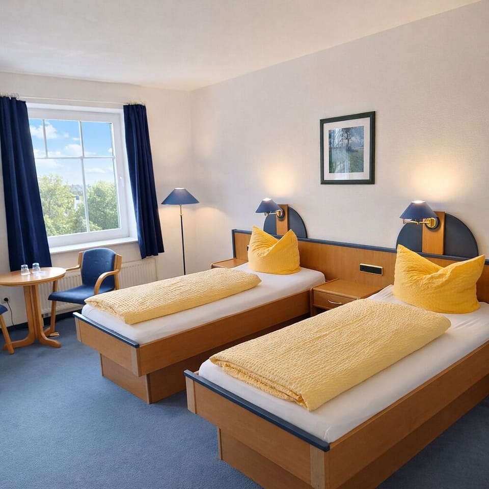 Twin Room | Hypo-allergenic bedding, minibar, in-room safe, blackout drapes