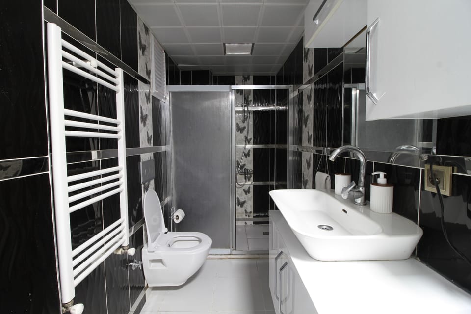 Standard Double Room, City View | Bathroom | Separate tub and shower, hair dryer, towels, soap