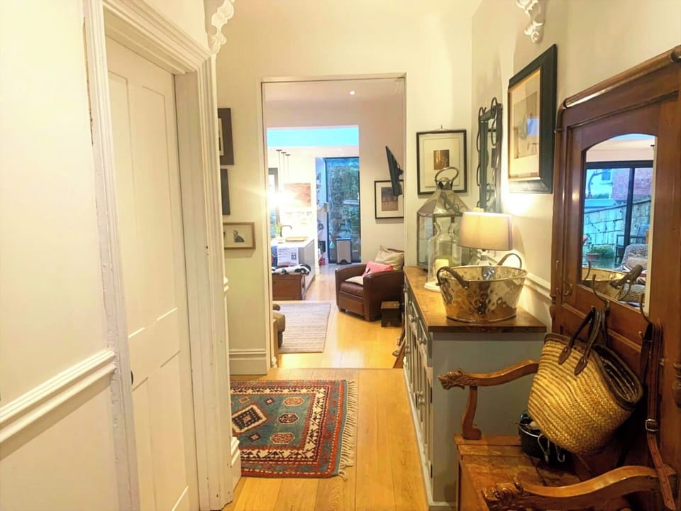 Hallway from front door looking through the kitchen/diner/lounge space