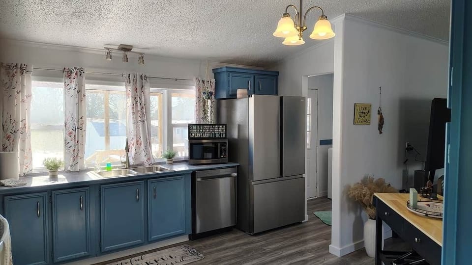 Fully equipped kitchen for group meals at Trophy Trout Basecamp cabin