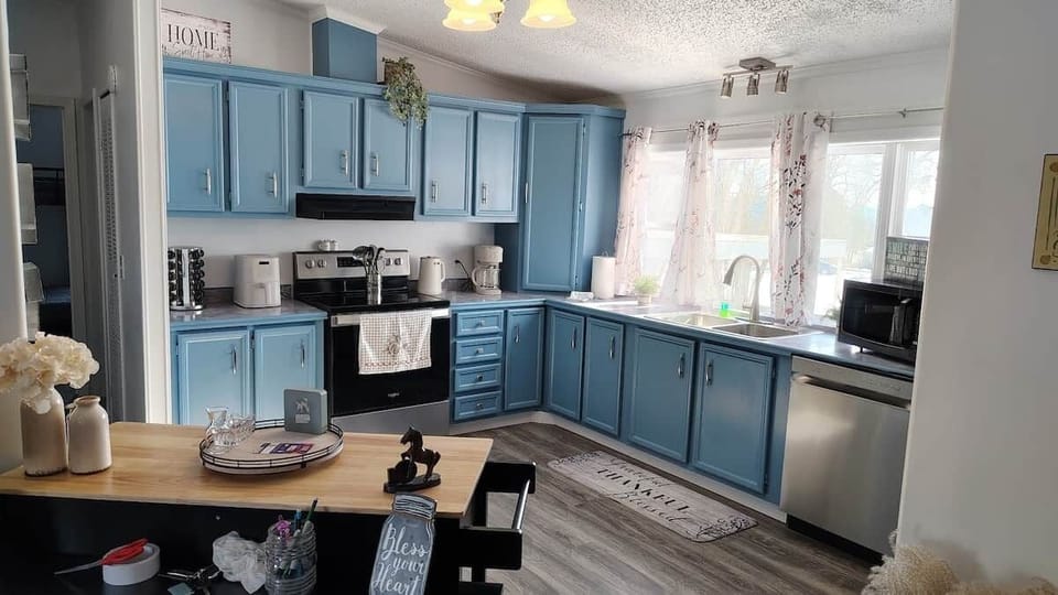 Fully equipped kitchen for group meals at Trophy Trout Basecamp cabin