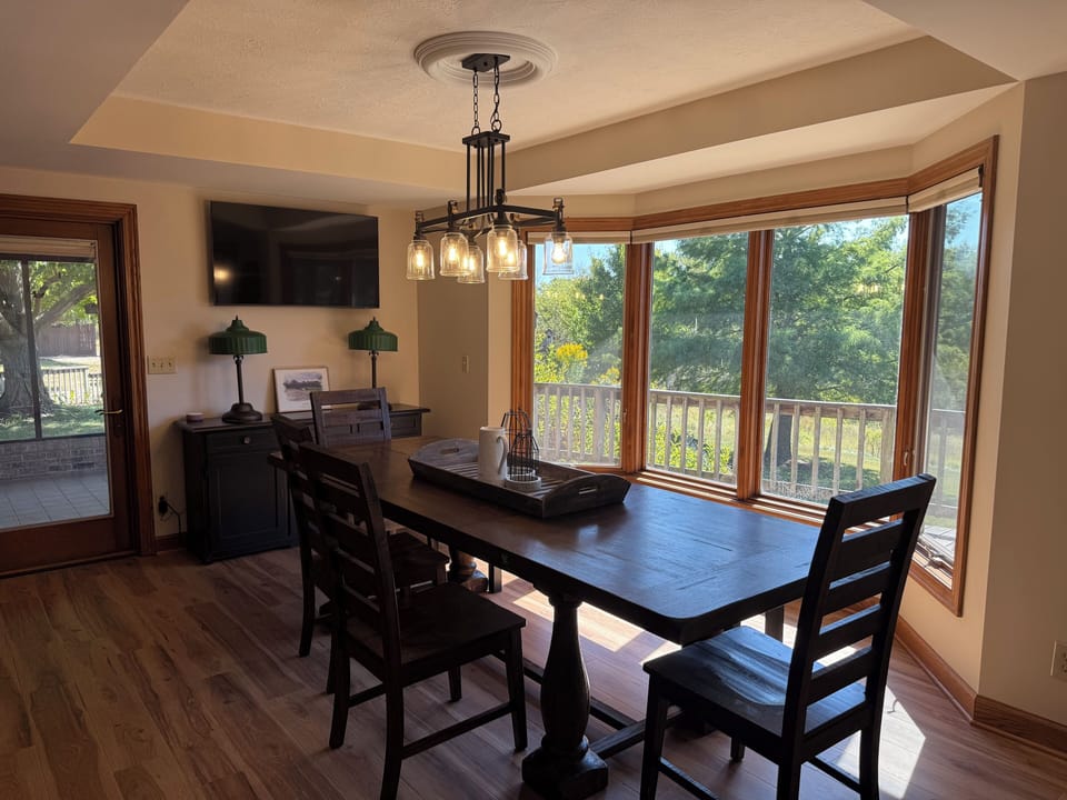 Dining area with direct access to attached screened in porch. 