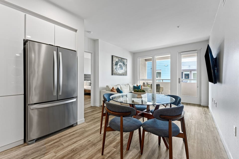 Enjoy meals in this bright dining space right off the fully equipped kitchen.