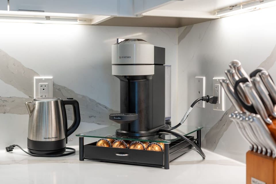 Fuel your morning with the Nespresso machine and gourmet coffee station.