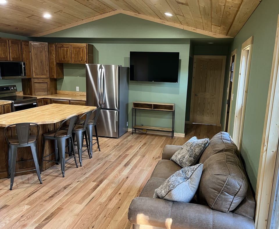 Kitchen and living area with smart tv
