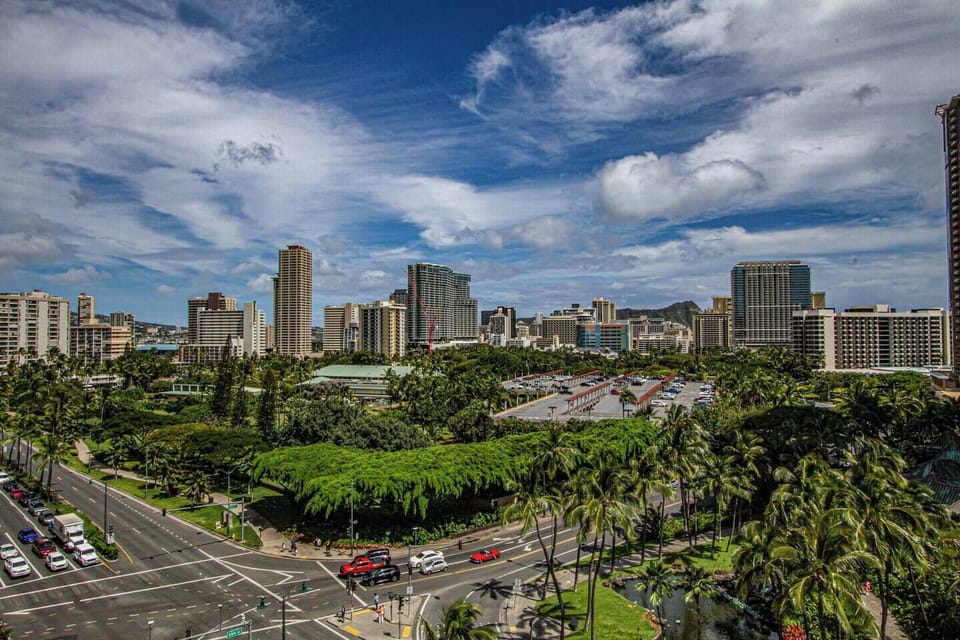City/street views from balcony.  Hilton Hawaiian Village located across the street.  Fort DeRussey Park across the street