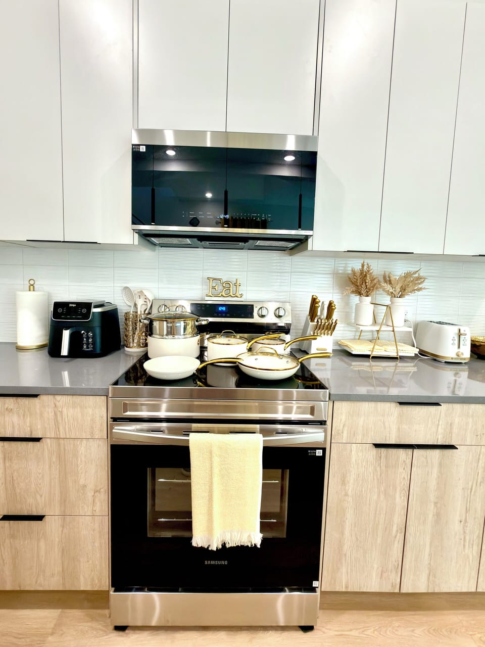 Kitchen with all needed cookwares and air fryer