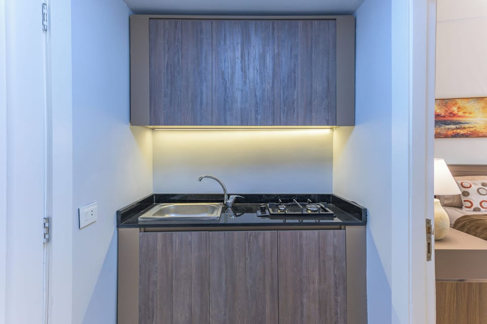 House, 4 Bedrooms, Balcony, City View | Private kitchenette | Espresso maker, mini-fridge, microwave, stovetop