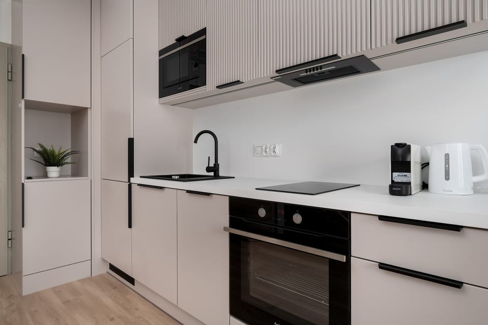 The kitchenette's practical layout maximizes space and functionality.