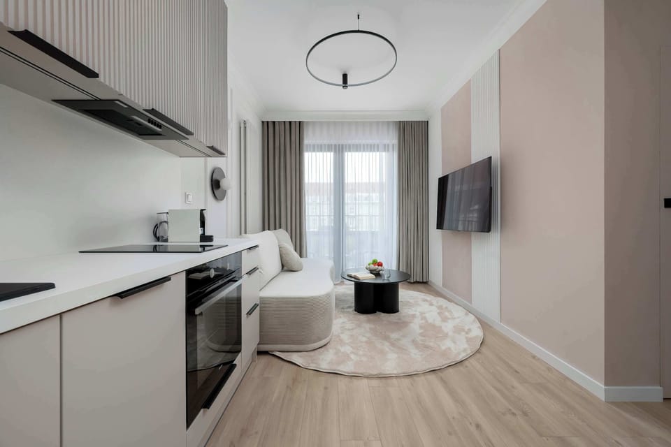 The elegant living room perfect for both relaxation and entertainment.