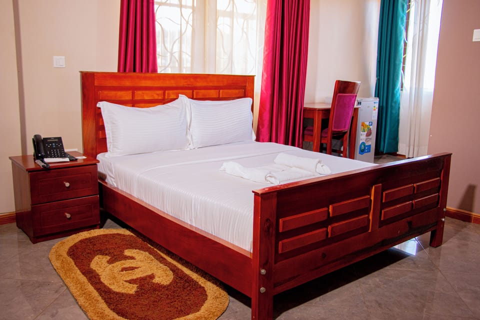 Premium bedding, pillowtop beds, desk, laptop workspace