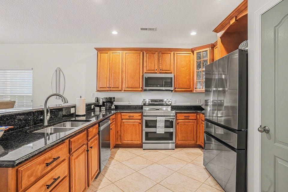 Spacious kitchen with stainless steel appliances