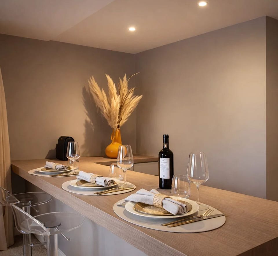 Deluxe Apartment, City View | Living area | 80-cm Smart TV with digital channels