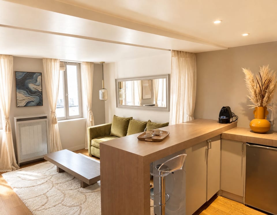 Deluxe Apartment, City View | Living area | 80-cm Smart TV with digital channels