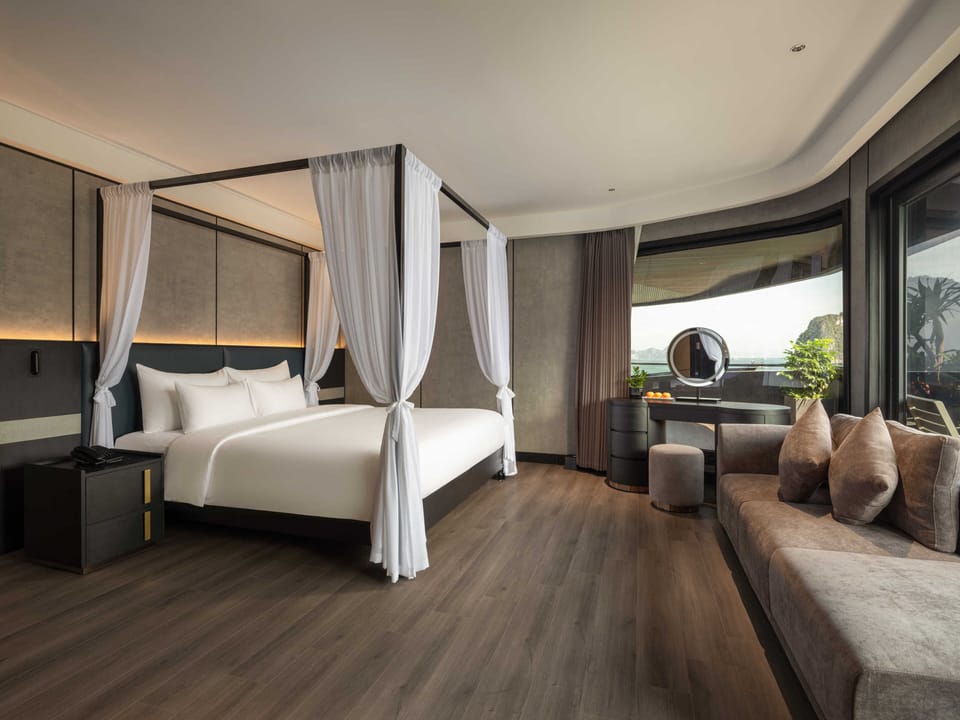 Elite Suite with Private Balcony (1 Extra-Large Double Bed) | In-room safe, laptop workspace, blackout drapes, soundproofing