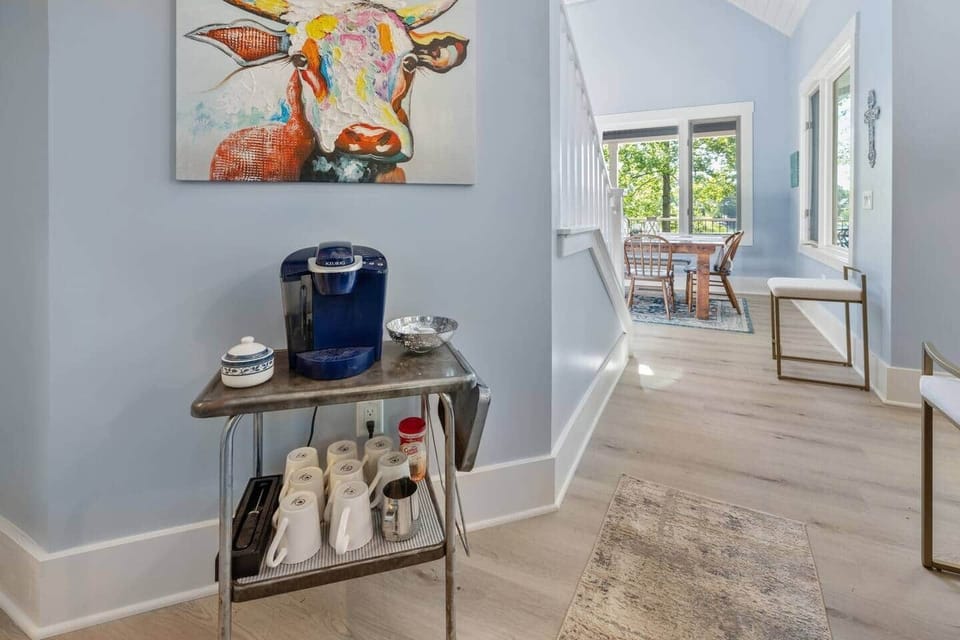 Fully stocked coffee bar with a Keurig maker.