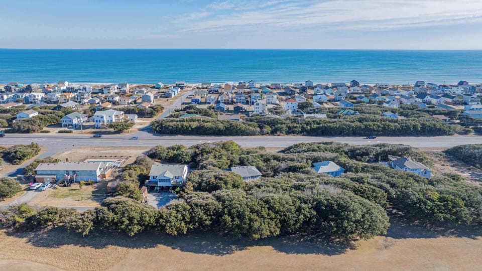 Above it all, in the best way. Spacious, serene, and perfectly placed for relaxation—this is what getaway goals look like from the sky.