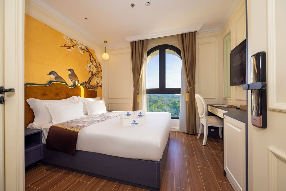 Superior Double Room, Partial Sea View | In-room safe, desk, free WiFi, bed sheets