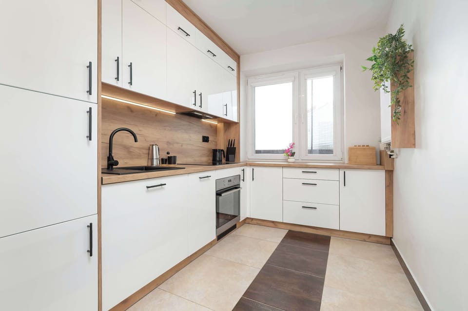 The kitchen's modern appliances make meal preparation easy.