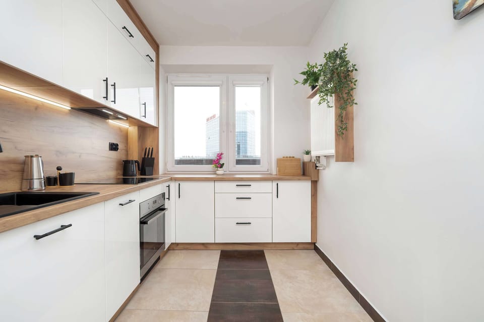 The kitchen offers a functional layout for convenient cooking.